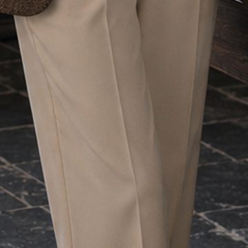 Cream pleated trousers